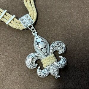 Fleur De Lis silver and rope necklace with shiney gems